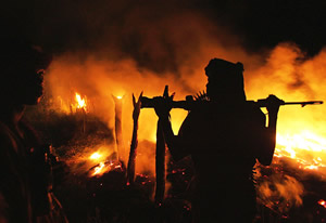 300,000 dead and 2 million displaced in Darfur.